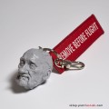 Macierewicz - Brelok_RemoveBeforeFlight.jpg